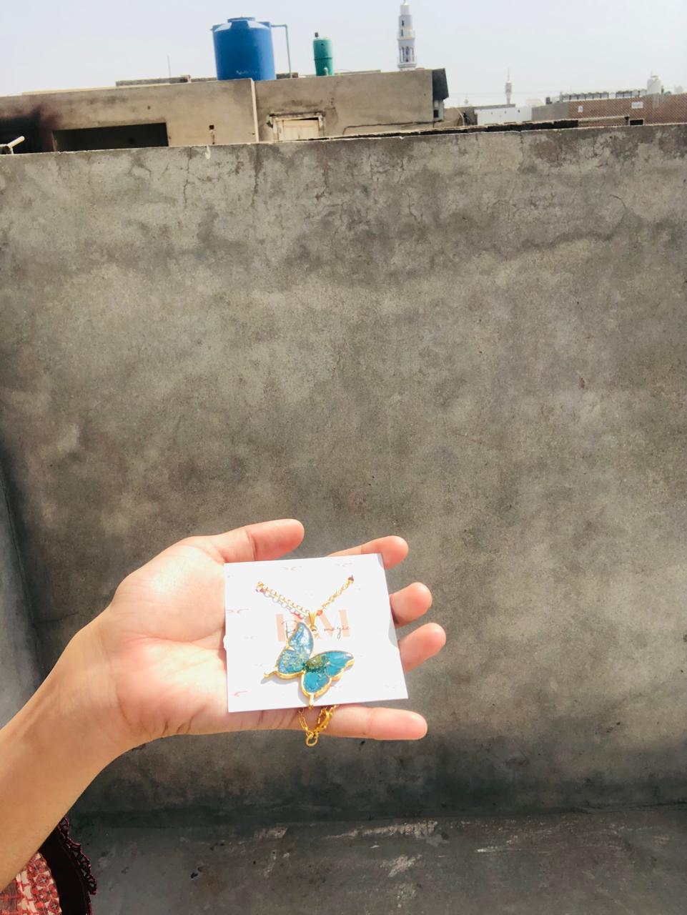 RESIN BUTERFLLY PENDENT